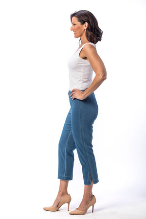 Holland Ave Susan Denim Crop Pant in Vintage Blue. Pull on hidden waistband pant with faux zipper flap. Snug through hip falls straight to hem. Side slits. 25" inseam._13120027328610