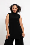 Sympli Sleeveless Mock Neck Slit Tunic in Black. Mock neck long top with asymmetric front hem. Off side wrapped seam with slit. Relaxed fit. Tunic length._t_34038761259208