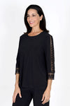 Ours Barbie Crochet Sleeve Top in Black. Banded crew neck with 3/4 sleeve. Crochet lace inset down center of sleeve. Crochet lace cuff. A line shape. Relaxed fit._t_34656862142664