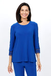 Ours Barbie Crochet Sleeve Top in Royal. Banded crew neck with 3/4 sleeve. Crochet lace inset down center of sleeve. Crochet lace cuff. A line shape. Relaxed fit._t_34656862109896