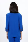 Ours Barbie Crochet Sleeve Top in Royal. Banded crew neck with 3/4 sleeve. Crochet lace inset down center of sleeve. Crochet lace cuff. A line shape. Relaxed fit._t_34656862175432