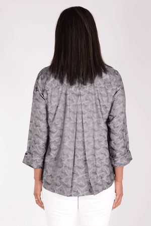 Cali Girls Betty Camo Blouse in Charcoal. Foil print abstract camo swing blouse. Pointed collar button down with covered button placket. 3/4 sleeve with fold-back cuff. Bright pink zipper detail in front. Inverted back pleat. Relaxed fit._34354838864072