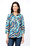 Cali Girls Betty Swirls Blouse in Multi. Shades of blue, yellow and white swirl print with red accents. Pointed collar button down with hidden button placket. 3/4 sleeve with wide cuff and button detail. Inverted back pleat. Relaxed fit._t_34826830053576