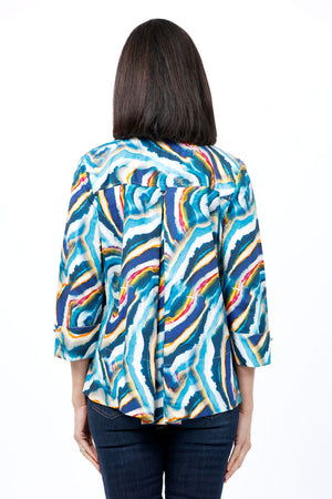 Cali Girls Betty Swirls Blouse in Multi. Shades of blue, yellow and white swirl print with red accents. Pointed collar button down with hidden button placket. 3/4 sleeve with wide cuff and button detail. Inverted back pleat. Relaxed fit._34826830086344