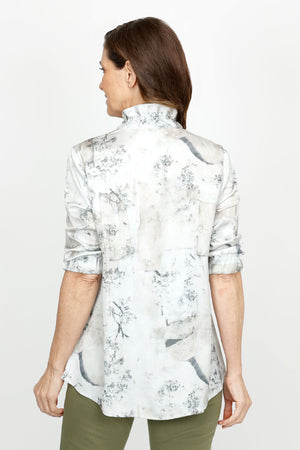 Beau Chemise Bobbi Floral Print Blouse in Green .  Muted miniature floral print on a marbled beige background.  Adjustable wire standup collar button down.  3/4 sleeve with wide elastic cuff.  2 front angled welt pockets.  Curved hem.  Relaxed fit._61394617074030