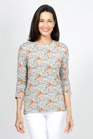 Lolo Luxe Watercolor Floral Top.  Orange large floral and miniature vintage floral print on a mint green background.  Crew neck 3/4 sleeve top with ruched sleeve hem.  Relaxed fit._34940530524360