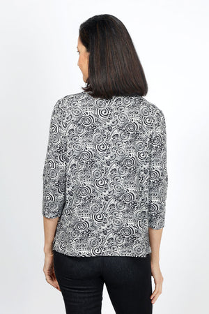 Lolo Luxe Sherri Scroll Flames Top. Abstract black spiral print on a smoke background. V neck 3/4 sleeve top. High low hem. Relaxed fit._34940537831624
