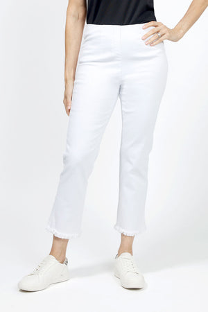 Holland Ave Denim Frayed Crop in white.  Pull on pant with hidden elastic waist and faux fly.  Smooth through the stomach and thigh, falls straight to the hem.  2 back curved patch pockets. Frayed hem. 26" inseam._34977857274056