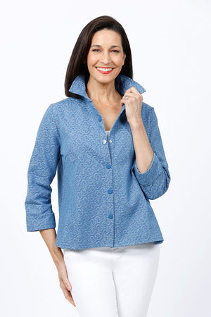 Lolo Luxe Vintage Denim Hearts Swing Jacket in Vintage Blue. Jacquard abstract heart print. Pointed collar snap front swing jacket with 3/4 cuffed sleeve. Boxy shape. Relaxed fit._35264129269960