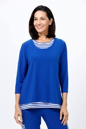 O.U.R.S. Lindsay 2 Layer Stripe Top in Royal/White. 2 layer top with striped crew underlayer. Solid jersey scoop neck over layer. 3/4 sleeve. Side slits on top layer. Relaxed fit._34656921288904