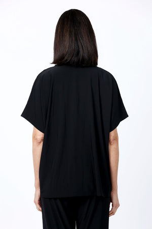 O.U.R.S. Stacey Ruched Front Top in Black. Crew neck dolman short sleeve top. Center front inset panel is softly gathered at the neckline and ruched at the hem. Inverted "U-shaped" hem. Plain back. Relaxed fit._34815855952072