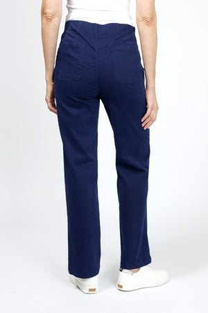 Holland Ave Diana Wide Leg Jean in Denim. Pull on pant with hidden elastic waistband and faux front fly. Smooth fit through stomach widens to hem. 30" inseam._34940573843656