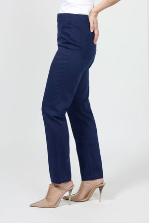 Holland Ave Olivia Straight Leg Jean in Dark Denim. Pull on pant with hidden elastic waistband and faux fly. Snug through stomach and hip falls straight to hem. 2 back curved pockets. 29" inseam._34981405130952
