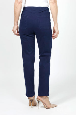 Holland Ave Olivia Straight Leg Jean in Dark Denim. Pull on pant with hidden elastic waistband and faux fly. Snug through stomach and hip falls straight to hem. 2 back curved pockets. 29" inseam._34981405163720