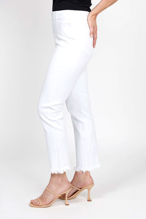 Holland Ave Frayed Denim Ankle Pant in white. Pull on pant with elastic hidden waist. Slim leg with frayed hem. 27" inseam._35432074870984