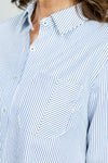 Cali Girls Stripe Blouse with Herringbone Pocket in Denim/White.  Narrow blue vertical stripe on a white background.   Pointed collar button down with 3/4 sleeve. Split cuff.  Shirt tail hem.  Single diagonal stripe breast pocket.  Relaxed fit._t_52875953242478