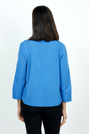 Cali Girls Shortie Blouse in Bright Blue.  Button down shirt with pointed collar.  3/4 sleeve with wrapped cuff.  Shirt tail hem.  Relaxed fit._53001589391726