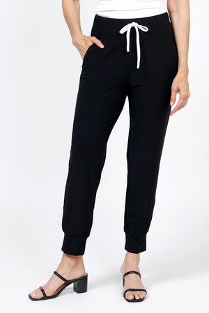 Organic Rags Stephie Jogger in Black.  Drawstring waist pull on pant with 2 front slash pockets.  Cuffed bottom. White drawstring.  Poly/jersey fabric.  29" inseam._35298336833736