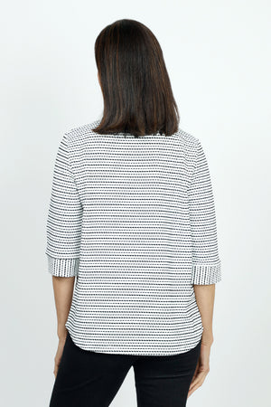 Top Ligne Button Cuff Stitch Stripe in Black/White.  Broken stripes in Black on a white background. Stand collar with v placket.  3/4 sleeve with 2 buttons at cuff.  Curved hem.  Relaxed fit._53001370009966
