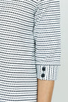 Top Ligne Button Cuff Stitch Stripe in Black/White.  Broken stripes in Black on a white background. Stand collar with v placket.  3/4 sleeve with 2 buttons at cuff.  Curved hem.  Relaxed fit._t_53001369485678