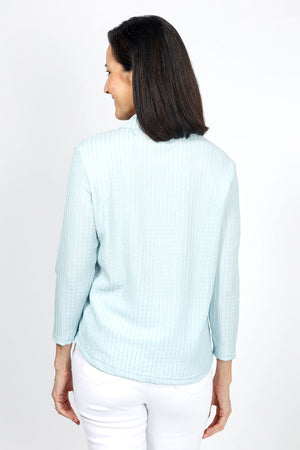 Top Ligne Snap Front Pucker shirt in Aqua. Pointed collar snap front top with pairs of snaps. Textured top. 3/4 sleeve. shirt tail hem. Relaxed fit._34977685864648