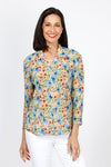Top Ligne Pleated Floral Snap Front Shirt. Blue and pink floral vine print on a beige background. Pointed collar snap front shirt. Tiny vertical pleating. 3/4 sleeve. Relaxed fit._t_35322847887560