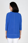 OURS Darla Front Seam Top in Royal blue. Crew neck tunic length tub with 3/4 sleeve. White double top stitching detail down center front and back and at hem. Cut out side slits. Relaxed shape._t_35491947675848