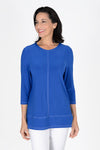 OURS Darla Front Seam Top in Royal blue. Crew neck tunic length tub with 3/4 sleeve. White double top stitching detail down center front and back and at hem. Cut out side slits. Relaxed shape._t_35491947643080