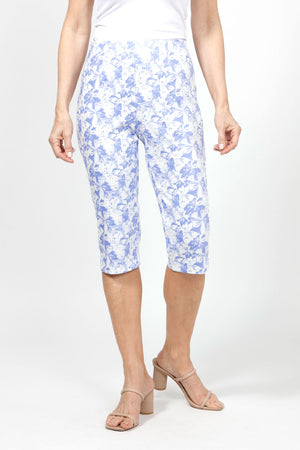 Holland Ave Julia Abstract Floral Pedal Pusher.  Periwinkle abstract floral print on a white background.  Pull on pant with hidden elastic waistband and faux fly.  Snug through stomach and hip slim through leg.  17" inseam._34995723600072