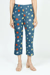 Holland Ave Sarah Floating Flowers Wide Leg Crop.  Red white and yellow scattered flowers with green leaves on a blue denim background.  No waistband pull on pant.  Snug through the stomach; relaxed through the leg to hem.  25" inseam.  _t_52987910652270