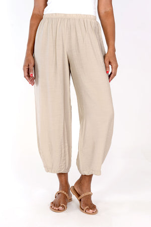 Organic Rags Crop Pant with Dart in Rye. Elastic waist pull on pant with dart at hem. Draped leg. 11" leg opening. 26" inseam._35458229076168