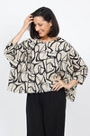 Organic Rags Marble Print Cropped Top in Rye with black swirled print. Crew neck 3/4 sleeve oversized boxy top. One size fits many._t_35287088988360