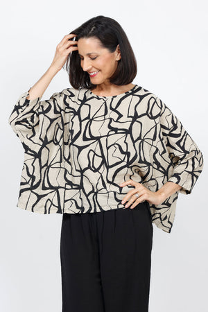 Organic Rags Marble Print Cropped Top in Rye with black swirled print. Crew neck 3/4 sleeve oversized boxy top. One size fits many._35287088988360