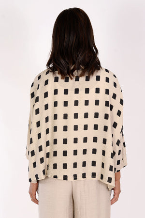 Organic Rags Square Print Crop Top in Rye (beige) with Black squares. Crew neck dolman top with drop shoulder and 3/4 sleeve. One size fits many. Oversized with drape._34247533953224
