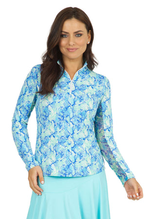 IBKUL Cora Print Mock Neck top in Jade/Blue.   Mock neck 1/2 zip top with long sleeves.  Mesh underarm panels.  Moisture wicking UPF 50+ fabric.  Unique Icefil technology keeps you 5 degrees cooler.  Classic fit._34329556156616
