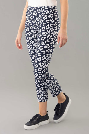 Lisette L Montreal Fortuna Ankle Pant in Navy with white vintage floral print. Pull on ankle pant with 3" elasticized waist band. Snug through stomach, slim to hem. 28" inseam._34960204234952