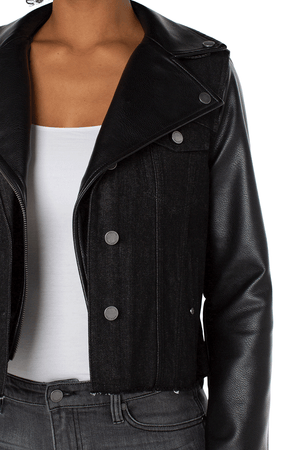 Liverpool Hybrid Moto jacket in Black. Moto asymmetric collar and double snap sleeves on the body of a jean jacket. Grommet buttons. Contour seams. Raw hem. Classic fit._34537595338952