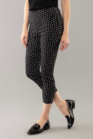 Lisette L Montreal Panda Thinny Crop. Stylized white dot print on a black background. Pull on pant with 3" waistband. Snug through stomach, hip, thigh and leg. 25" inseam._34999393616072