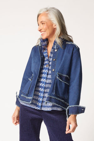 Habitat Stretch Denim Cargo Jacket in Dark Denim.  Stand collar button front jean jacket.  Long sleeves with button cuff.  2 large flap cargo pockets in front.  Back yoke.  Fringe trim.  A line shape.  Relaxed fit._61400398791022
