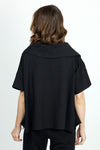Planet Scuba Drape Neck Top in Black. Drape cowl neck with short dolman sleeves. Scuba fabric. Side slits. Boxy shape. Oversized fit._t_36030539366600