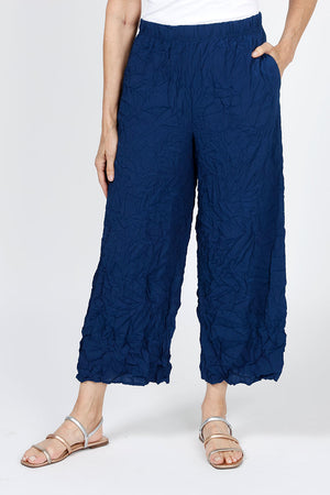 LIV by Habitat Crimped Easy Crop Pant in Navy. 1 1/2" waistband crinkled pull on pant with side seam pockets. Leg falls straight from hip. 26" inseam_35347051708616