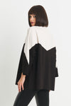 Planet Scuba Chevron Top in Black/Vanilla. 2 tone top with rolled funnel neck and dolman 3/4 sleeve. Colors are separated top to bottom in a chevron pattern. Oversized fit. Swing shape. One size fits most._t_34304457769160
