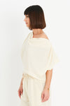 Planet Peachskin Top in Butter. Boatneck dolman short sleeve top. Off the shoulder. Boxy shape. Side slits. One size fits many._t_34903032070344