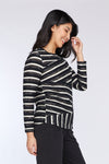 Neon Buddha It's a Vibe Top in Black. Pieced strips of solid white & black with space dye black/white pieced together to create a unique stripe. Pieced panels in front. Long sleeves. Horizontal stripe back. Curved hem. Classic fit_t_34654913069256