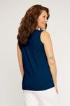 Neon Buddha Tank Top with Pocket in Night, a medium blue. Crew neck sleeveless tank with off center seaming in front. Piece construction with cotton and stretch jersey front panels. Single front button pocket. Step hem in front. Relaxed fit._t_35323304837320