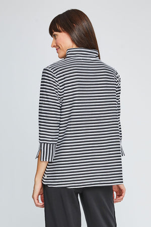 Neon Buddha Textured Stripe Jacket in Black. Black white and gray textured horizontal stripes. Stand collar button down jacket with mother of pearl buttons. 3/4 sleeve with split cuff with vertical stripes. High low hem. Relaxed fit._35335551221960