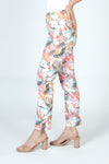 Lisette L Montreal Love Graffiti Ankle Pant in Multi. Multi colored graffiti print with heart motif.  3" waistband pull on pant with tummy control.  Snug through the stomach and hip and slim through leg.  28" inseam._t_59949950763374