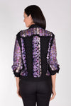 Frederique Flower Embossed Raw Seam Jacket in Black with plum and pink embossed mesh flowers. Jean jacket styling with mesh flower embossed inserts. Classic fit._t_34479334162632