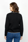 Metric 2 Tone Contrast Stitch Cardigan in Black.  Zip front with pointed collar and long sleeves.  Contrast color blanket stitch around neck, hem and cuff.  Lightly textured.  Slightly boxy shape.  Relaxed fit._t_61478215450990