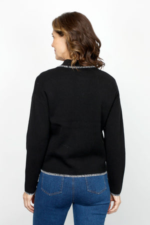 Metric 2 Tone Contrast Stitch Cardigan in Black.  Zip front with pointed collar and long sleeves.  Contrast color blanket stitch around neck, hem and cuff.  Lightly textured.  Slightly boxy shape.  Relaxed fit._61478215450990